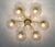 Italian modern flushmount with clear Murano glass globes with twisted texture on solid brass frame in lacquered polished...