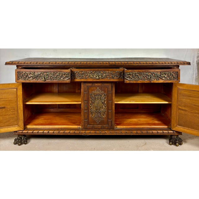 Impressive large oak sideboard in the Henry II and Renaissance Revival style, dating to the early 20th century. The piece...