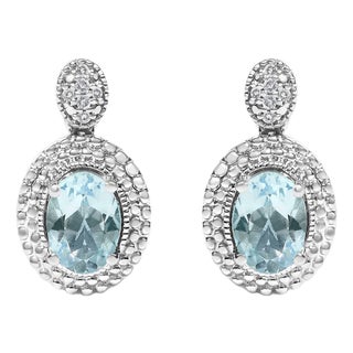 .925 Sterling Silver Diamond Accent and Oval Blue Topaz with Beaded Halo Drop Stud Earrings (I-J color, I1-I2 Clarity) For Sale