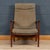 A mid century 'Manhattan' reclining armchair by Guy Rogers c1960's. A solid teak afromosia frame with a high backrest...