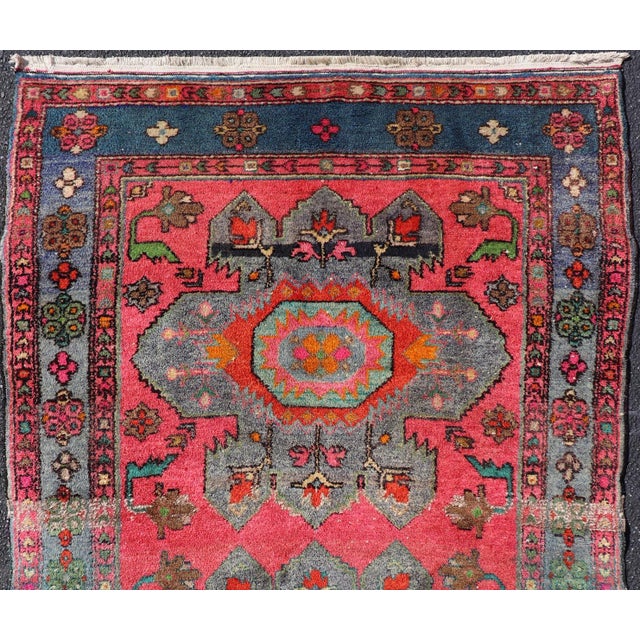 Measures: 3'9 x 6'1 Vintage Caucasian Kazak Rug with Twin Medallions and Blue Border 3'9 x 6'1. Keivan Woven Arts/...