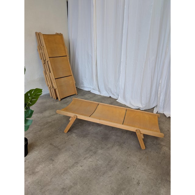 Vintage foldable wooden daybed originally designed in 1957 by renowned Slovenian designer Niko Kralj for children’s day...