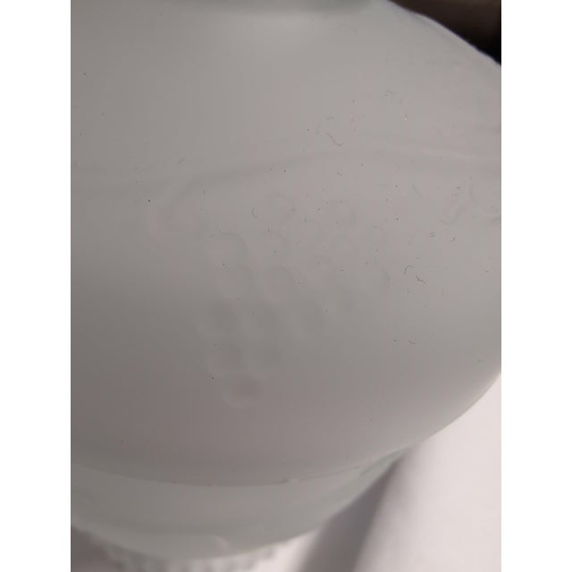 Vintage frosted glass covered dish featuring an elegant design. • Includes a matching lid with a decorative handle •...