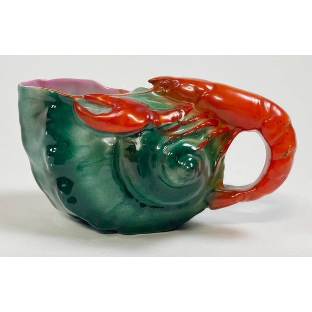 Vintage Royal Bayreuth ceramic creamer with a deep emerald green shell body and vibrant red lobster handle. Unmarked by...