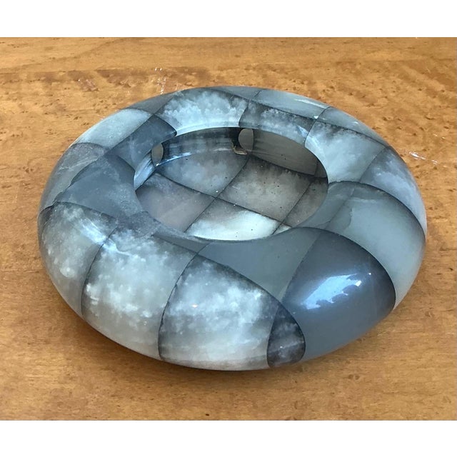 This vintage checkered stone decorative dish is a beautifully crafted object that blends graphic appeal with timeless...