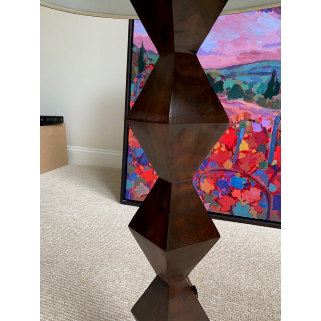 These fabulous custom lamps by Stephen McKay are in a distressed walnut. The lampshades are covered in Donghia Palazzo...