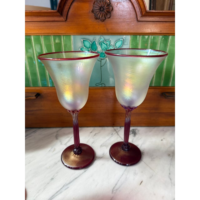 Fantastic Rick Strini art glass stems! The group includes 4 tall glasses: 2 opalescent with ruby lip and 2 royal ruby with...