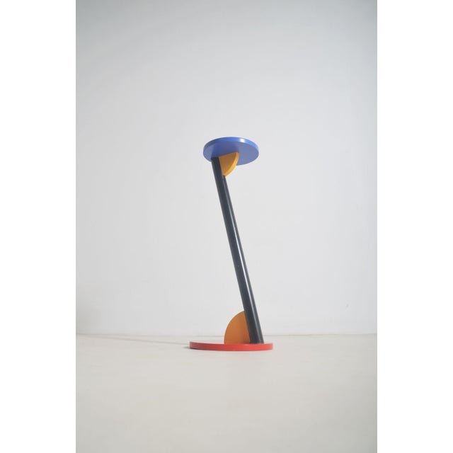 Wooden side table from the 80s in primary colours. This table ss a beautiful eye-catcher in your interior.