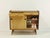 This charming vintage shoe cabinet dates back to the 1960s and combines functionality with typical mid-century design. The...
