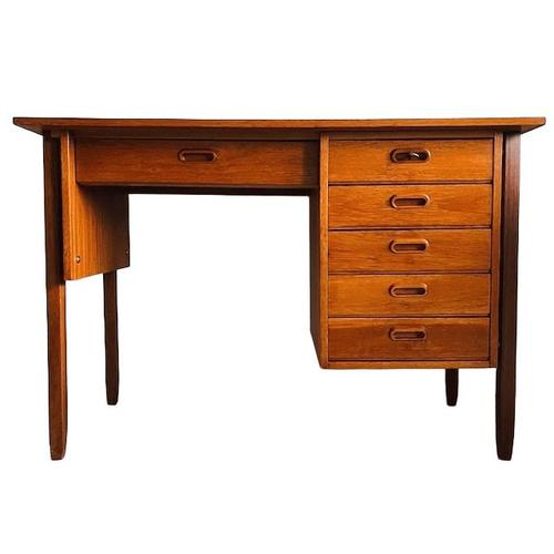 A beautiful, compact, vintage, mid-century Danish design desk made of teak from the 1960s. This Danish design desk...