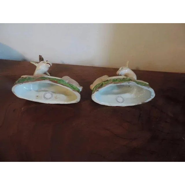 Pair of wonderful and quite large c. 1800 Staffordshire models of recumbent deer - a stag and a doe. The coats nicely...