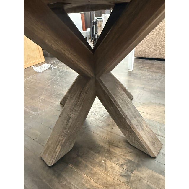 Design Plus Gallery presents an Abbott Concrete and Acacia Outdoor Round Dining Table from Pottery Barn. The circular...
