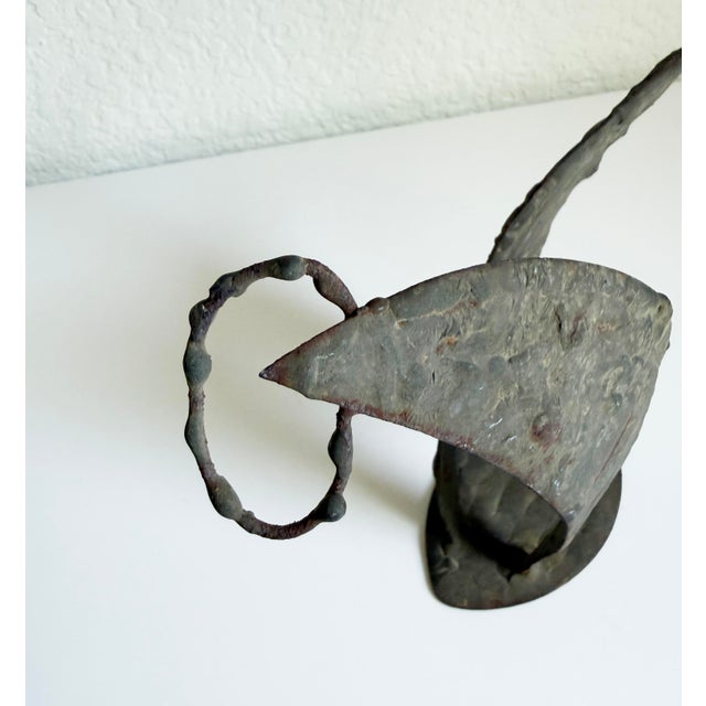 A one-of-a-kind sculpture from the mid-20th century featuring two abstract figures. Created in a brutalist manner, the...
