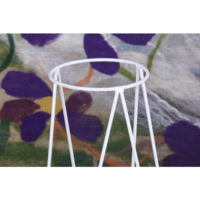 This stylish plant stand dates back to the 1950s and was manufactured in Czechoslovakia, where it represents a highly...