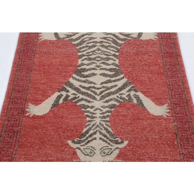 Hand-knotted in wool, this 3x6 runner rug is a striking new addition to our Distressed Homage collection, inspired by a...