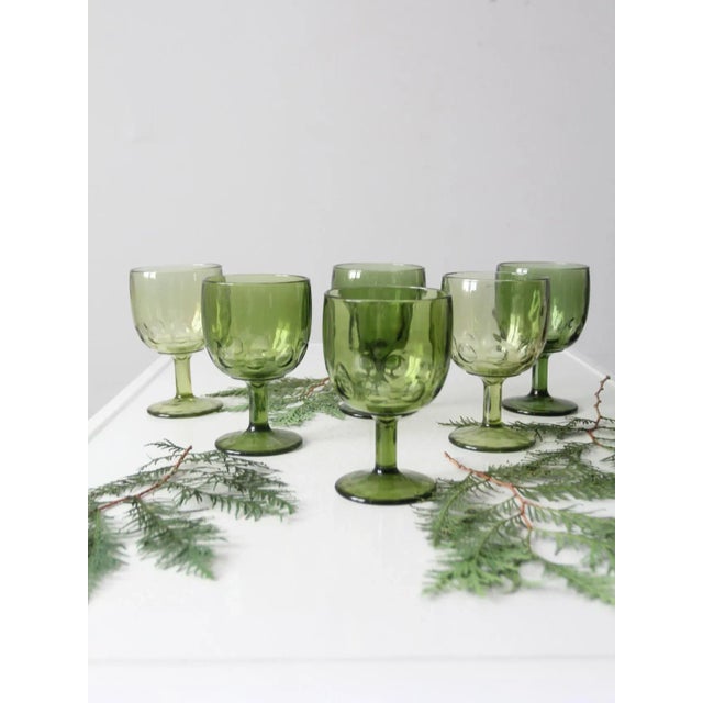 This is a set of six vintage Bartlett Collins glass goblets. The avocado green glasses have a wide bowl with "thumbprint"...