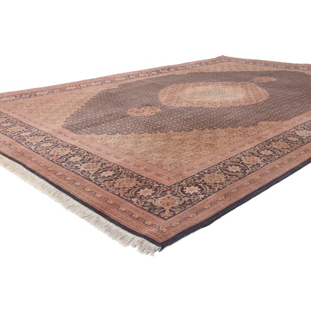 76981 Vintage Persian Tabriz Rug, 06'08 x 10'00. Timeless elegance meets traditional sensibility in this hand knotted wool...