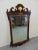 Chippendale style mirror made by Councill. Flame mahogany scalloped cut out frame with gold gilt shell carved accent on...
