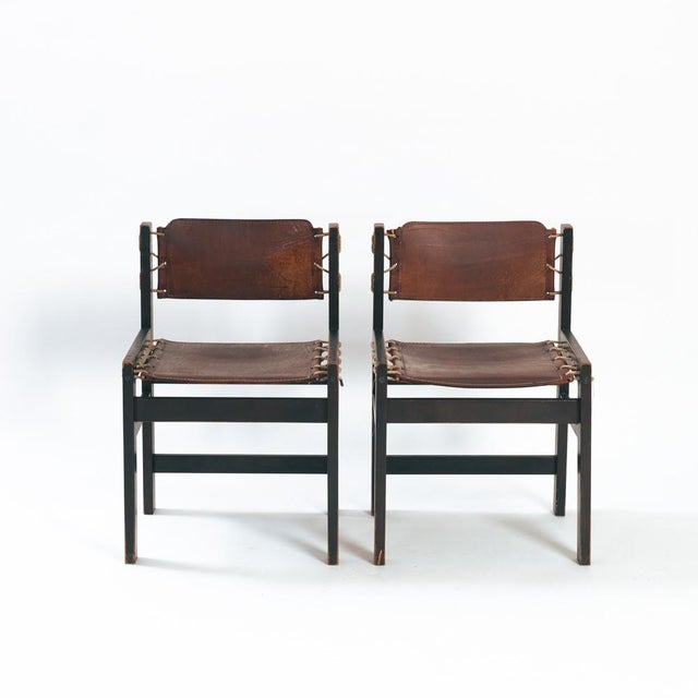 Beautiful and very rare set of 2 hideleather brutalist chairs from The Netherlands. Fully functional, all cleaned, waxed...