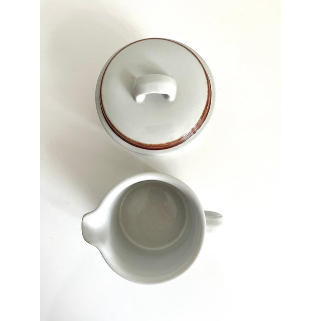 Arabia of Finland Rosmarin Brown designed by Ulla Procopé creamer and sugar bowl with lid set. Rosmarin Brown features...