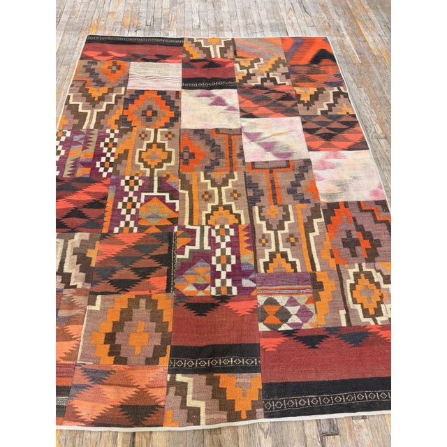 This is a vibrant and highly authentic mid-sized antique Turkish Village Kilim, Dating back to circa 1930, this pre-war...