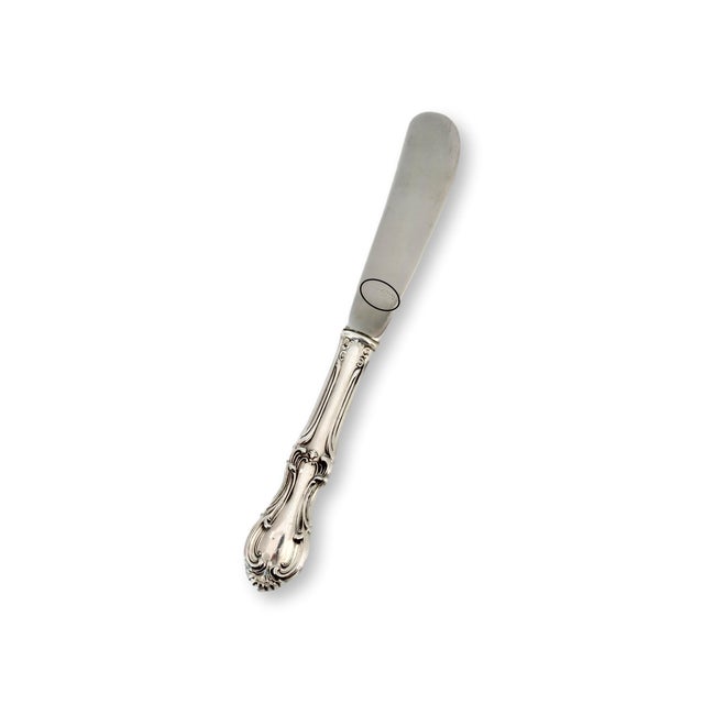Mid 20th century sterling silver butter knife in the iconic Joan of Arc pattern by International Silver. The elegant...