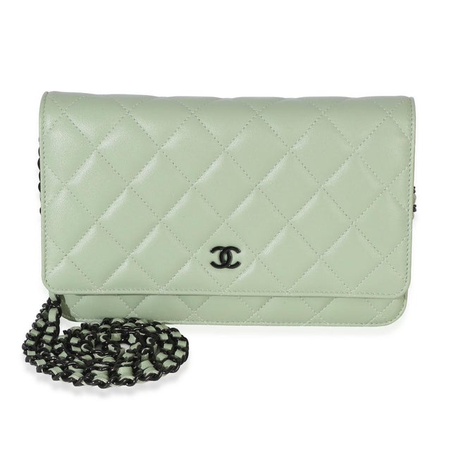 Item #: 153861 Interior Material: Fabric;Leather Size: Small Features Interior: Six card slots. Two slip pockets. Two zip...