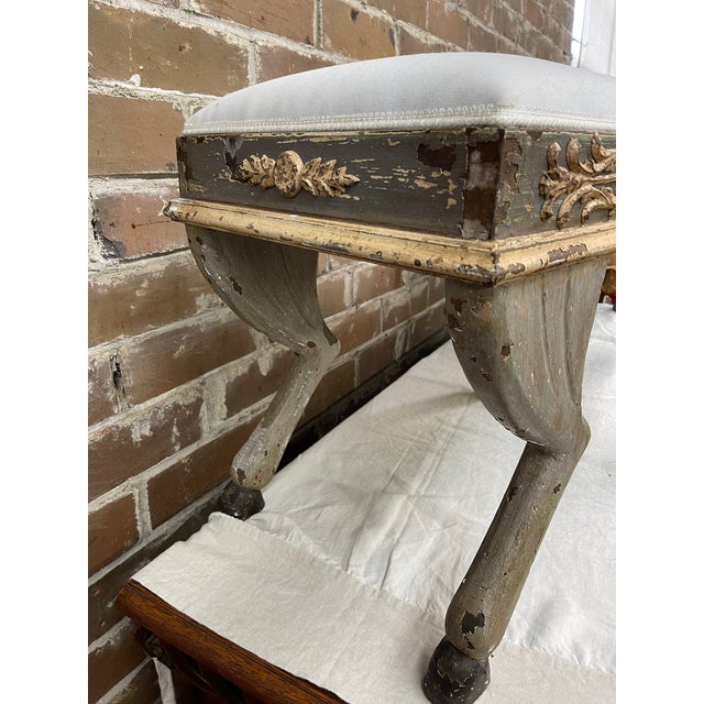 19th century Italian Neoclassical benches with carved curule style legs sculpted to mimic horse leges with hooves, The...