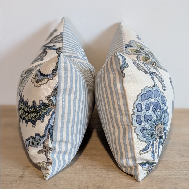 Cowtan & Tout Aubury Aqua floral lumbars with Schumacher blue striped backs. Fun mix and match combo! Invisible zippers...