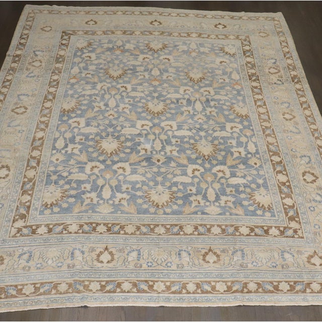 Early 20th Century Persian Meshed Rug with an all over design on a soft blue field