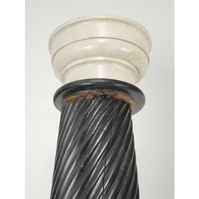 Vintage columns with spiral ebonized wood shafts and white marble capitals and bases. Good condition with surface wear,...