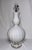 Ribbed white glass double gourd lamp with lucite base. 21” height to socket. 9.5” diameter at widest. 6” base diameter.