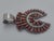 Authentic Zuni Handmade Petit Point Naja Pendant This exquisite Naja pendant features 37 carefully crafted Red Orange...