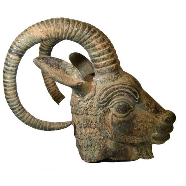 This Vintage Style Bronze Rams Head is a must-have for anyone looking to add a touch of vintage glamour to their home. The...