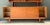 This vintage Drylund Danish teak hutch and sideboard embodies mid-20th-century Scandinavian design at its finest, pairing...