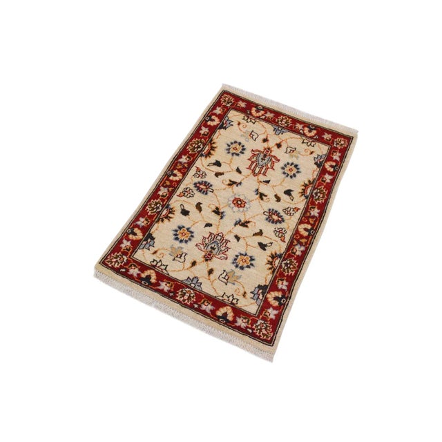 Designed with a mesmerizing intricate transitional and geometric motif this glorious hand knotted rug is a masterpiece...