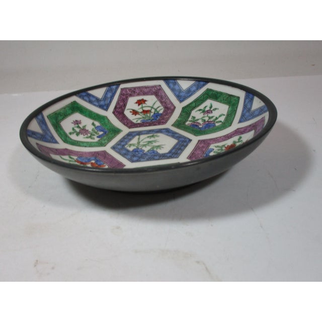 Mid 20th Century Asian bowl incased in pewter. The bowl was made for Neiman-Marcus and hand painted in Hong Kong. It is...