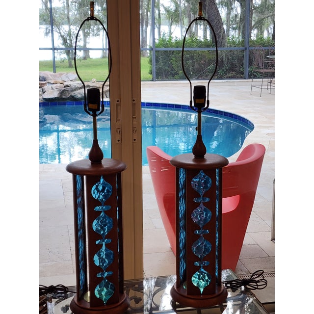 This listing consists of a mid century table lamp by Modeline. Three solid walnut panels have modern shaped cut-outs, and...