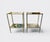 Pair of neoclassic two-tiered brass and glass side tables with oxidized mirrors. Attributed to Maison Jansen. In very good...
