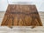 An elegant 1940s Art Deco dining table, featuring a splendid olive burl veneer that lends warmth and refinement to the...