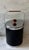 1960s mid century ice bucket by Kromex, featuring black faux alligator embossed vinyle, chrome lid and base and a warm...