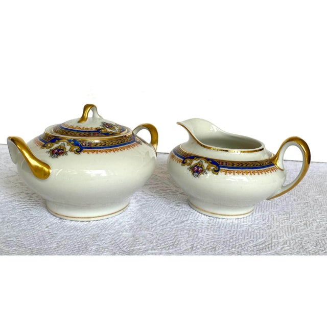 The Set is stamped with the Limoges France Unique mark, which was created in 1929 by the union of Limoges porcelain...
