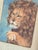 A charming and finely executed 19th century lion portrait miniature, rendered in oil on canvas and presented within a...