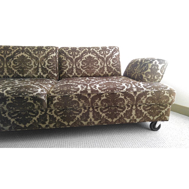 This is a truly unusual, custom piece of furniture with a great story behind it. I originally found the bones of the sofa...