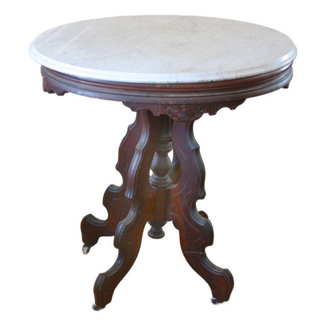 Antique Victorian Marble Top Carved Base Oval Parlor Table For Sale