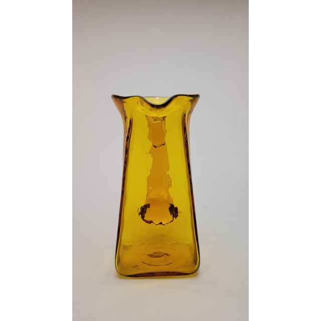 Mid century 1960's Jonquil yellow Blenko pitcher designed by Wayne Husted. This is catalog number 603 and is signed with...