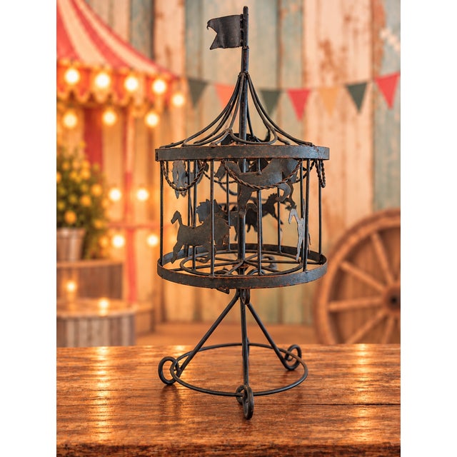 Bring the nostalgic charm of an old-fashioned carnival into your home with this impressive 28-inch metal carousel!...