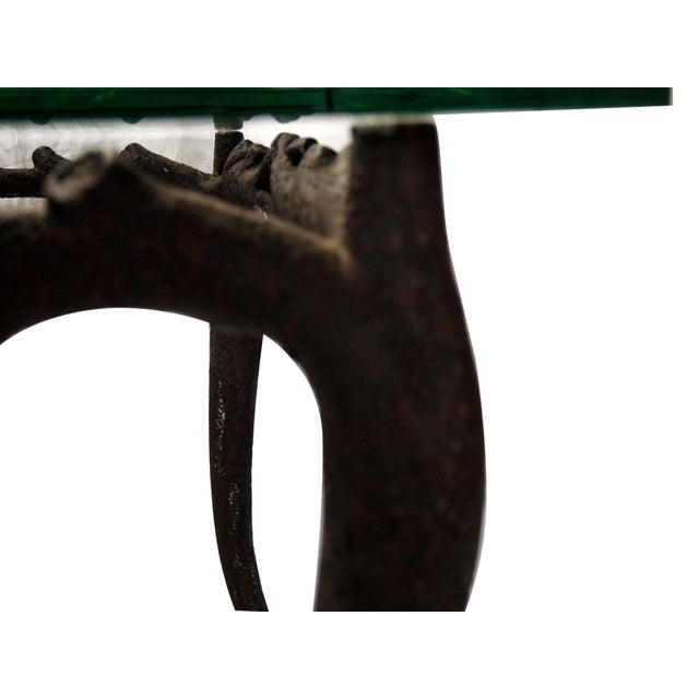 Painted cast iron faux bois glass top side table. There is some minor paint loss. Square glass top: 28". Base height: 24"....