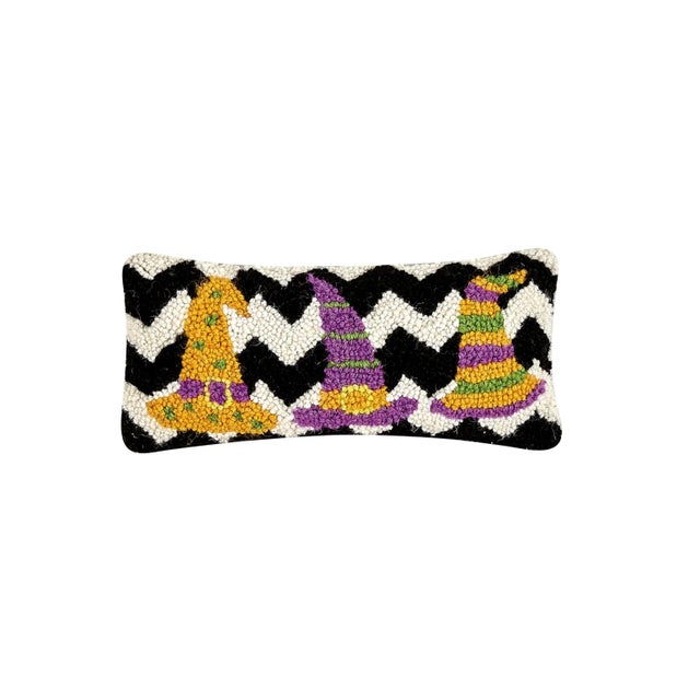 100% wool hooked throw pillow / accent pillow. Cotton/Velvet Blend backing. Includes 100% polyester insert with zipper...