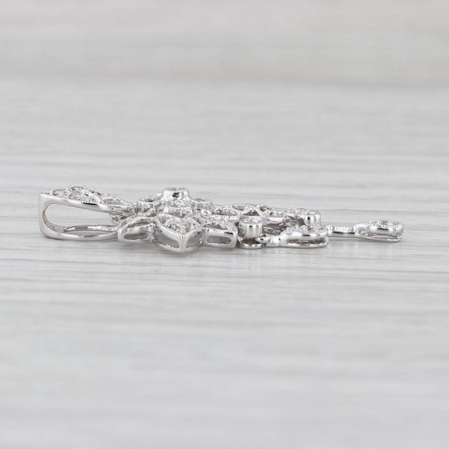 Gemstone Information: - Natural Diamonds - Total Carats - 0.12ctw Cut - Round Brilliant Color - I - L Clarity - SI1 - I1...